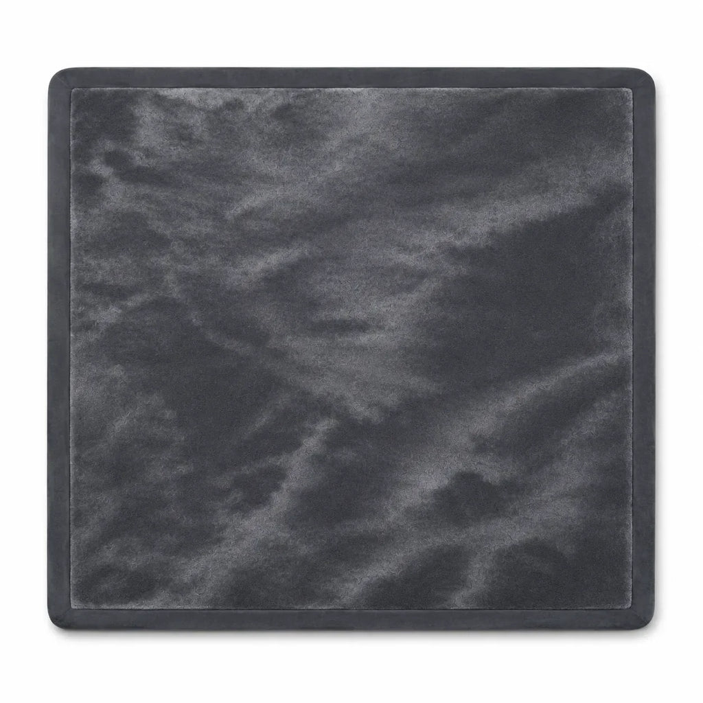 Top-down flat lay of the Charcoal play mat showing the velvet surface and 2-inch flat binding