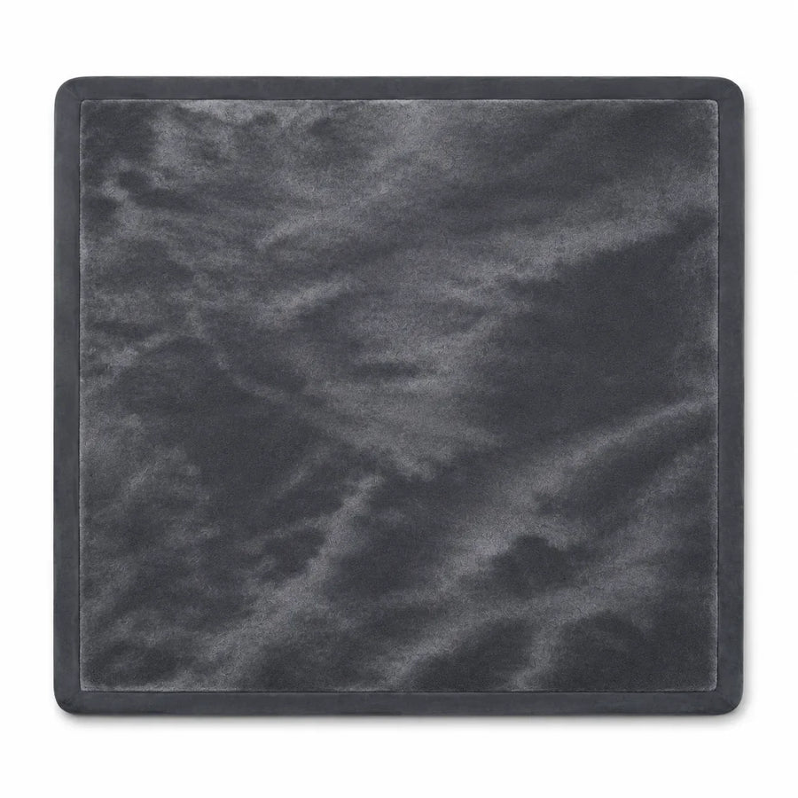 Top-down flat lay of the Charcoal play mat showing the velvet surface and 2-inch flat binding